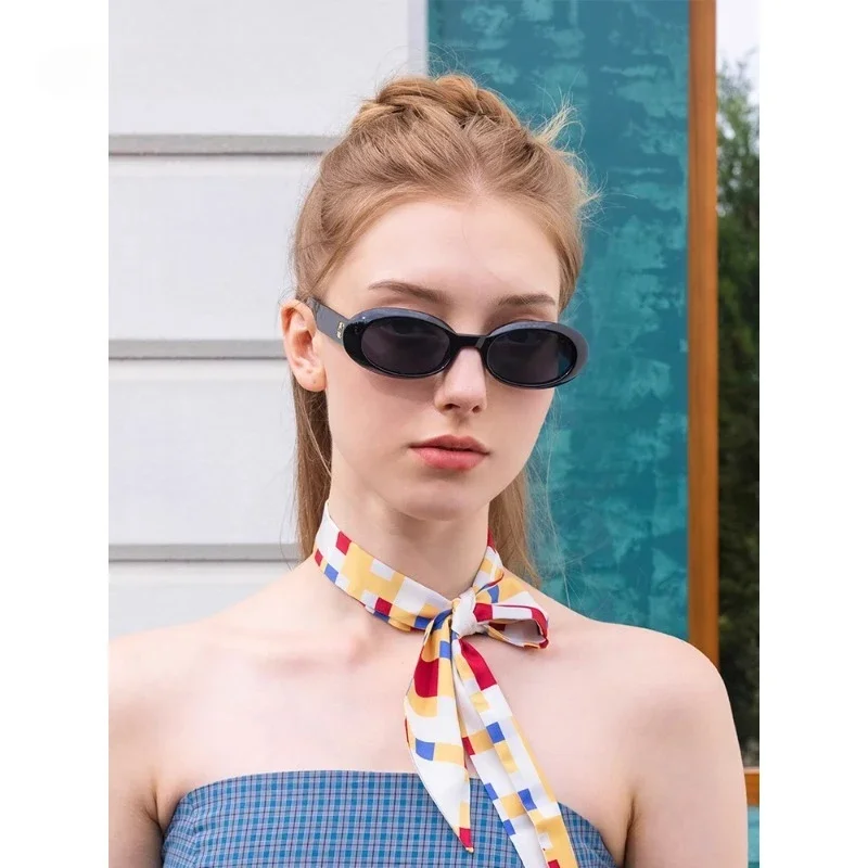 Sunglasses, black retro oval face-showing sunglasses.