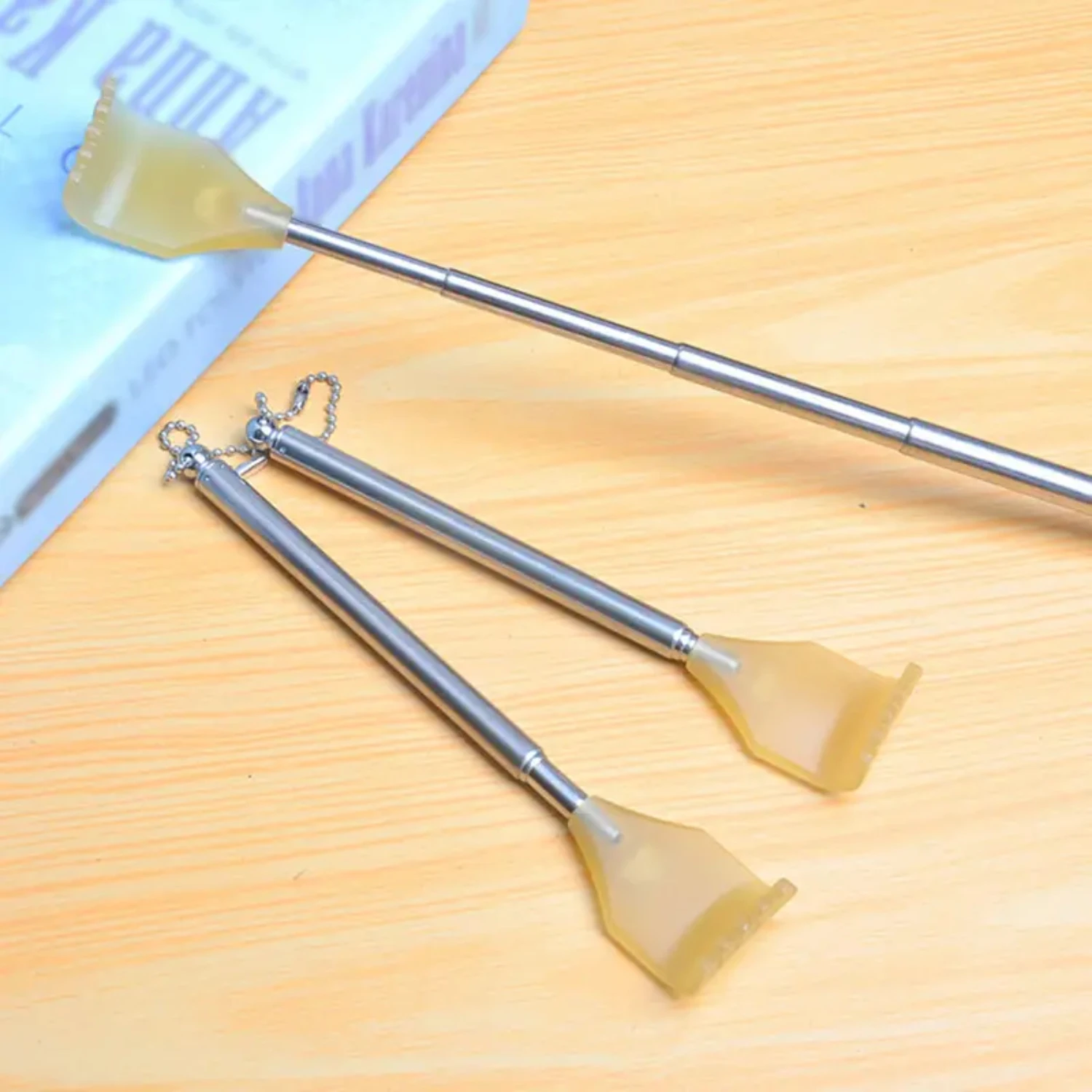 

Convenient and High-Quality Telescopic Back Grabber Tool Set - 2pcs Comfortable Massage Tickle Rake in Stainless Steel for Easy