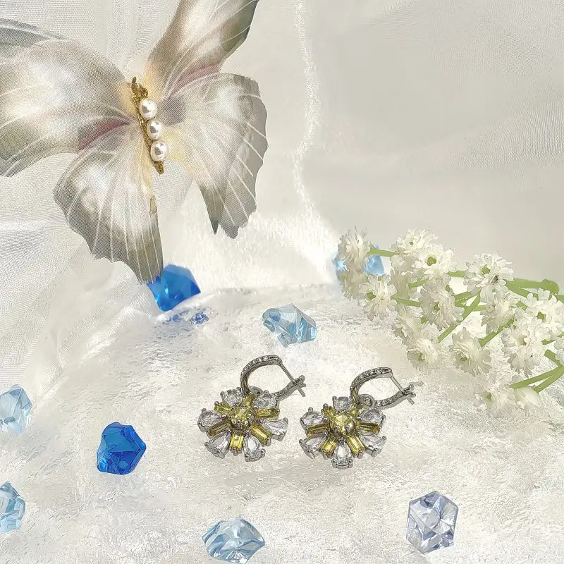 قلادة وأقراط وخاتم من الفضة الإسترليني عيار 925 مرصعة بالألماس الأصفر والأبيض وشعار SWA: أنيق وساحر