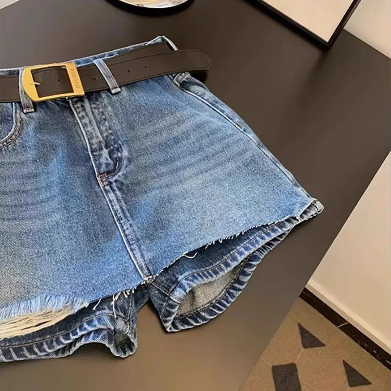 

Рваные джинсовые шорты с волосатыми краями для женщин, летние тонкие брюки-кюлоты трапециевидной формы с высокой талией, новинка 2023 года, универсальная брючная юбка с карманами в стиле ретро