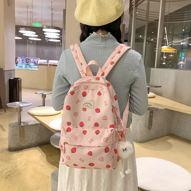 Nylon fabric lightweight student schoolbag, color-blocking strawberry print campus cute pendant backpack, travel small backpack