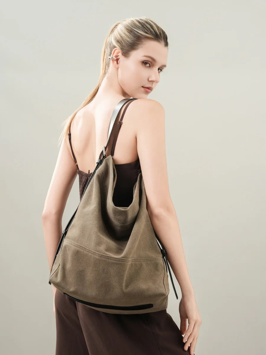 

Women's Cowhide Underarm Commuter Style Tote Bag Niche Design Single-Shoulder Hand-Held Large-Capacity Canvas Bag