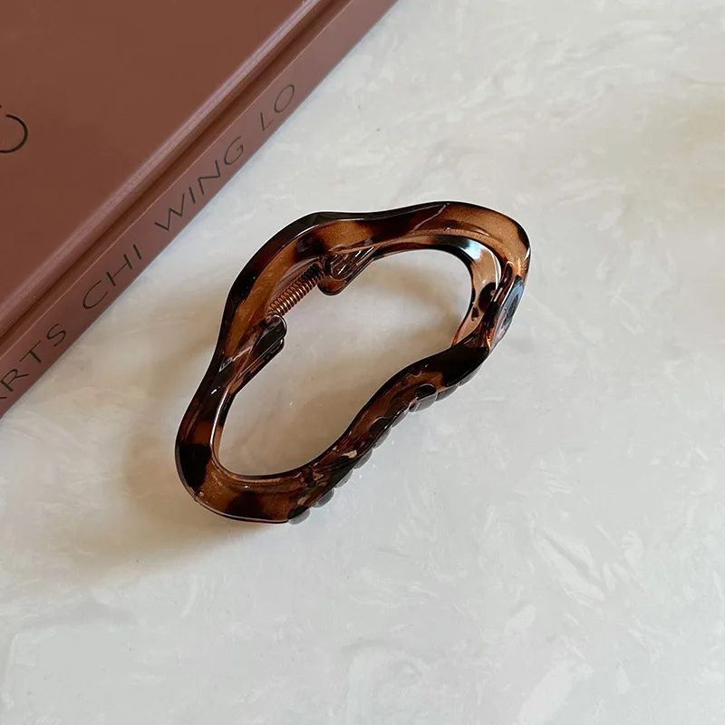 Рисунок 4 - Женские нерегулярные полые заколки для волос с когтями