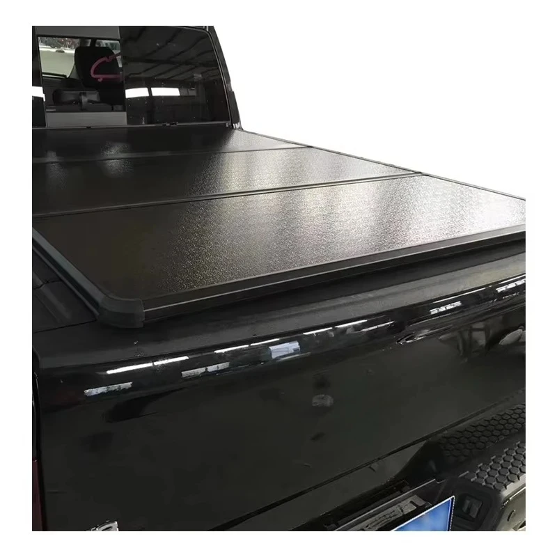 

Auto Parts Hard Roller Lid Retractable Aluminium Tri Fold Tonneau Cover for 1500 5.8ft 6.4ft