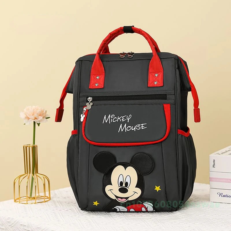 Bolsa de pañales Original de Mickey de Disney, mochila de marca de lujo con dibujos animados, bonita bolsa de pañales para bebés multifuncional de gran capacidad