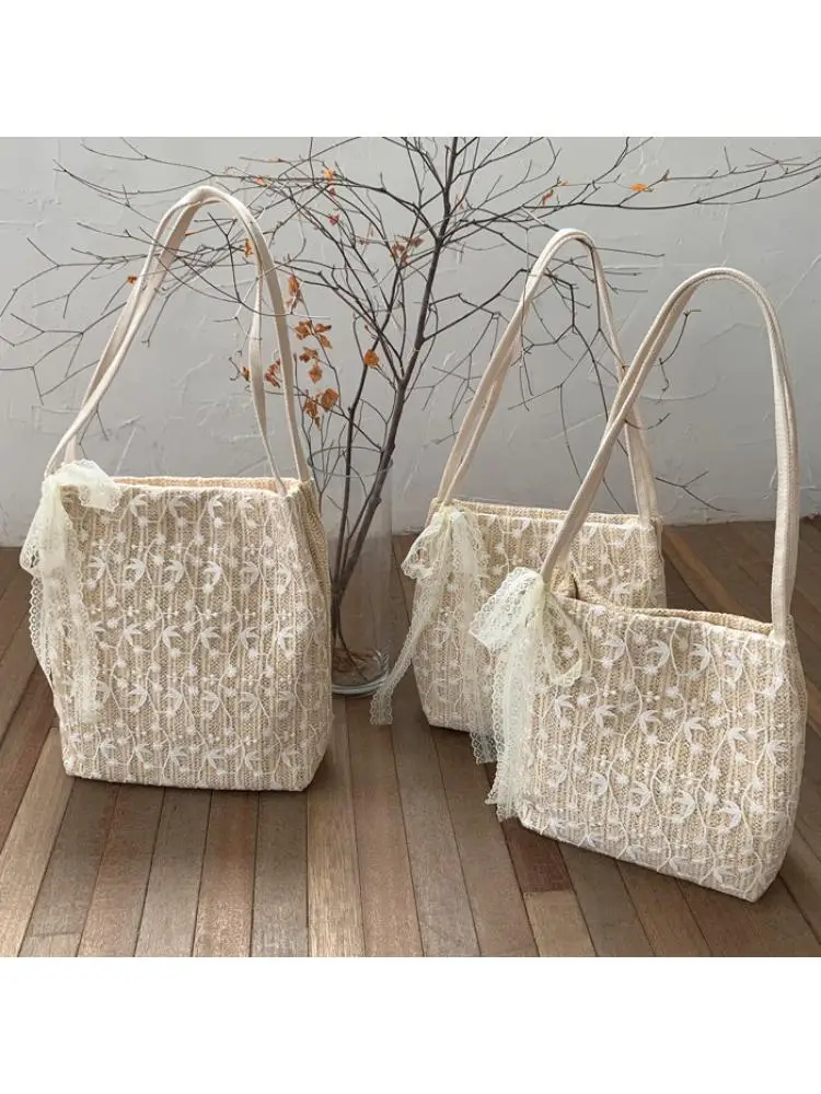 Fairy handbag 2023 han edition of the new fashion lace shoulder bag woven bucket bag joker straw bag