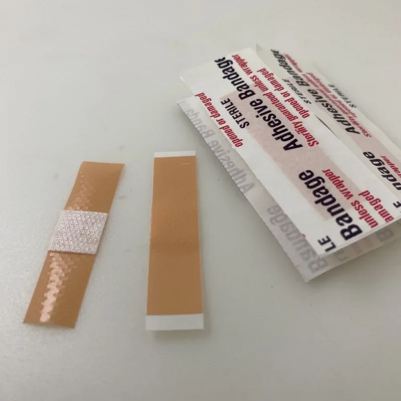 50pcs/set 4*1cm Band Aid Mini Elestic Wound Patch Sticking Plaster for First Aid Strips Adhesive Bandages Waterproof Woundplast