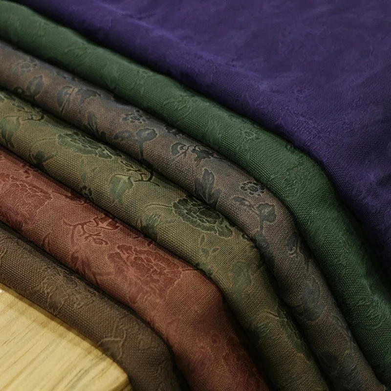 New Chinese-style cheongsam and Hanfu silk fabric with dark green perforated floral patterns jacquard