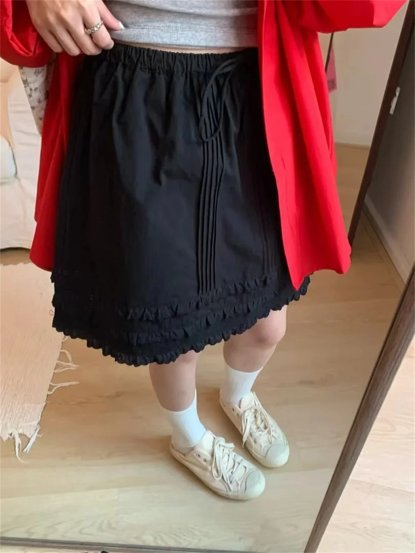 

Милая плиссированная юбка трапециевидной формы с галстуком-бабочкой и высокой талией, воланами f, женская юбка, осенняя коллекция Dongda Gate