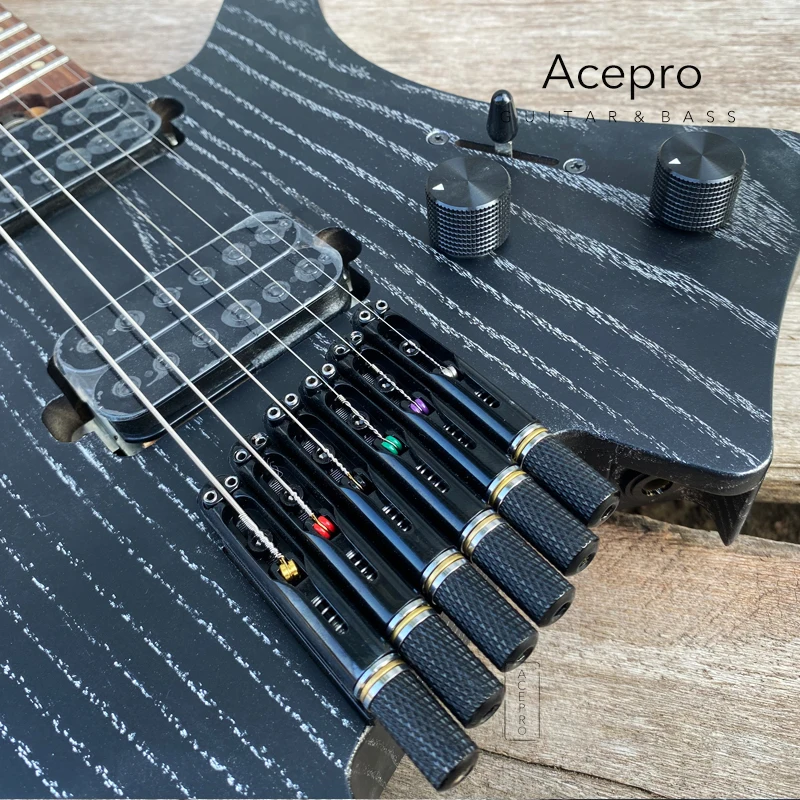 

Black Headless Electric Guitar, Mahogany Body, Rosewood Fretboard,Tree Grain, High Quality Stock, Wholesale Customization