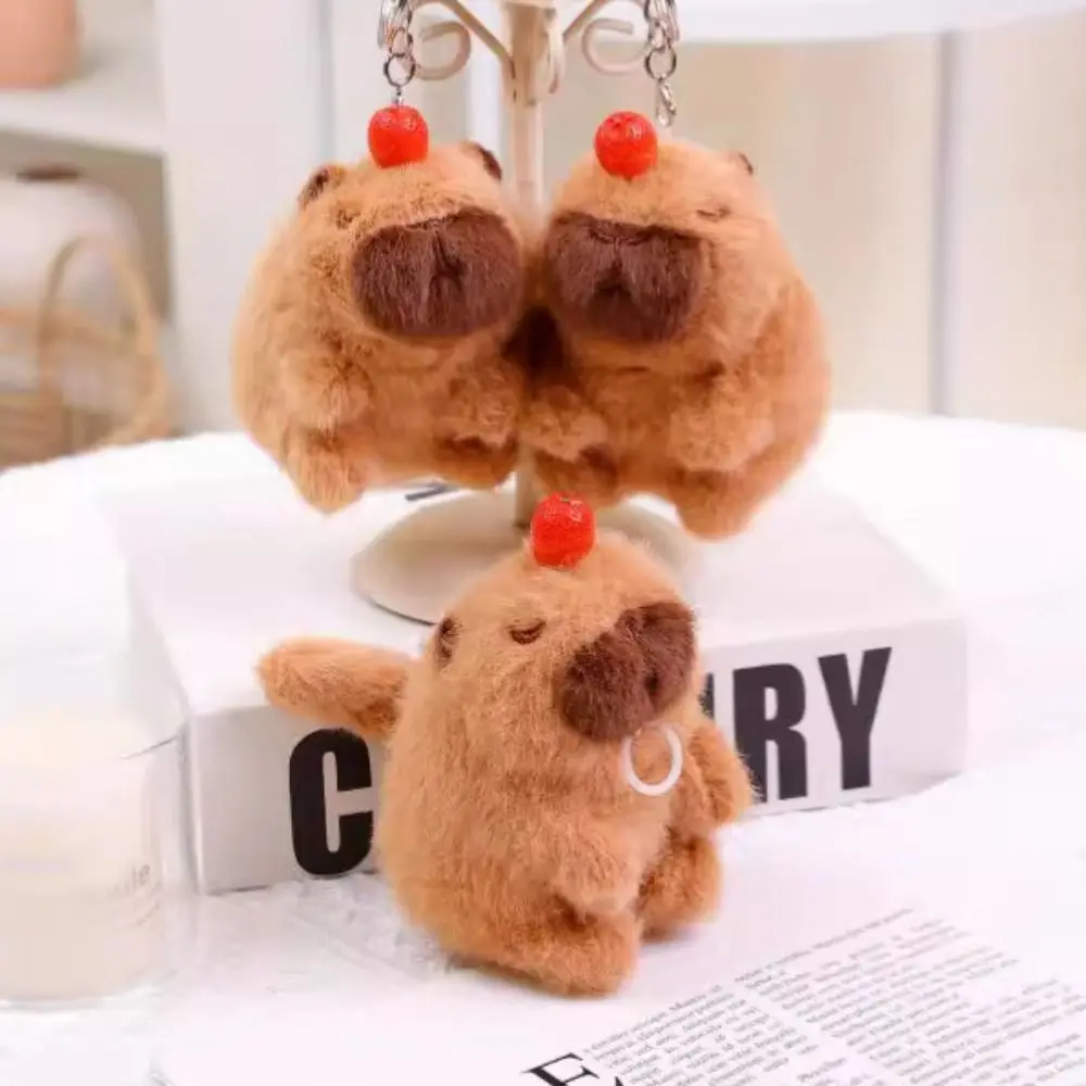 Animali di peluche luminoso peluche capibara portachiavi a forma di coda musica cartone animato coppia ciondolo 11cm morbido portachiavi Capybara quotidiano