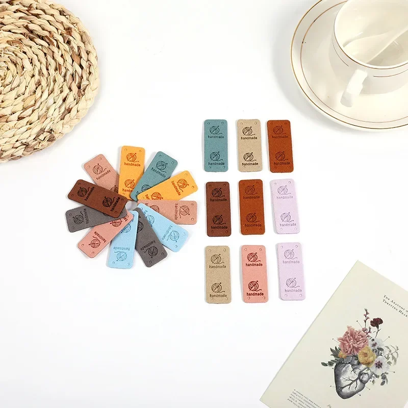 30Pcs 2x5cm Handmade PU Leather Tags with Wool Ball Sew on Labels Embellishment Knitting for DIY Crafts Sewing Labels