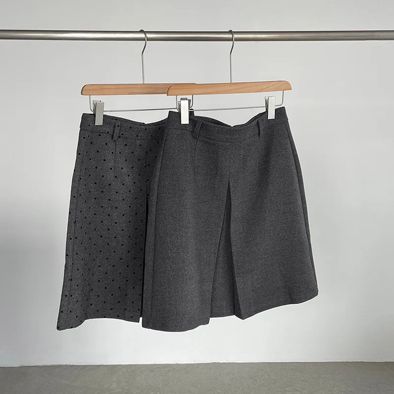 Jesienno-zimowa koreańska spódnica wełniana w stylu retro w grochy, pogrubiona, do połowy łydki, podkreślająca temperament.