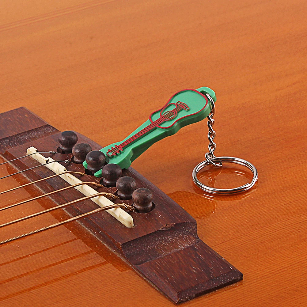 

Shaped Bridge Pin Puller With Keychain Guitar Accessory For Acoustic Folk Guitar Lightweight Portable Nail Pull Out Tool