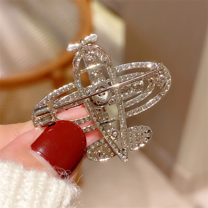 Luxury Pave Spinning Airplane Brooch Silver Plated Sparkling Cubic Zirconia Pin For Women Party Daily Use