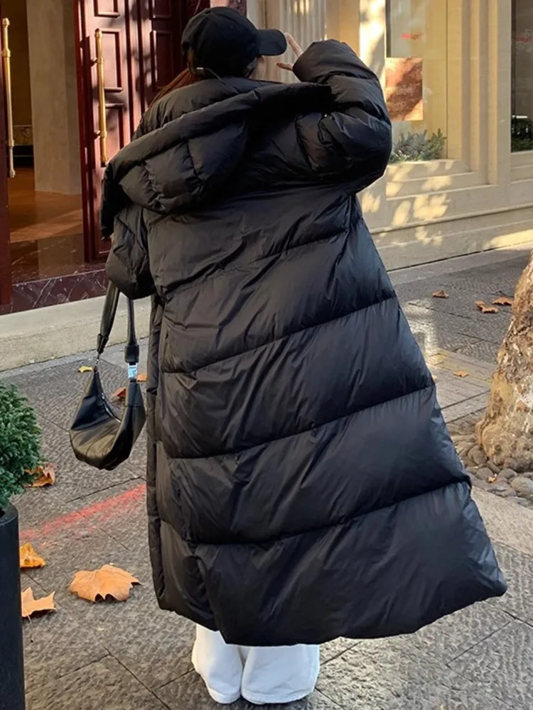 ZMEENNA المرأة سترة طويلة منتفخة الوقوف طوق مقنعين البريدي الكامل شتاء دافئ ماكسي ملابس خارجية فضفاضة تناسب الأسود ZM4478