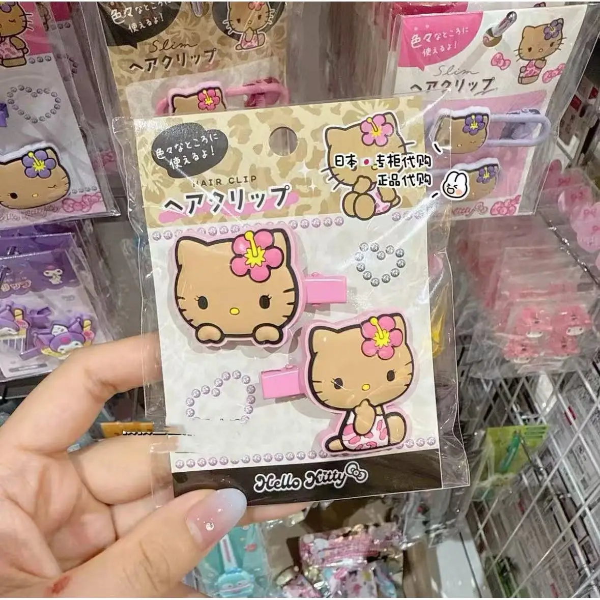 กิ๊บติดผมลายเฮลโลคิตตี้สีดำสไตล์ฮาวาย ซานริโอ้  ใหม่ล่าสุดสำหรับฤดูใบไม้ร่วงและฤดูหนาว เครื่องประดับผมน่ารักหวานๆ สำหรับเด็กผู้หญิง