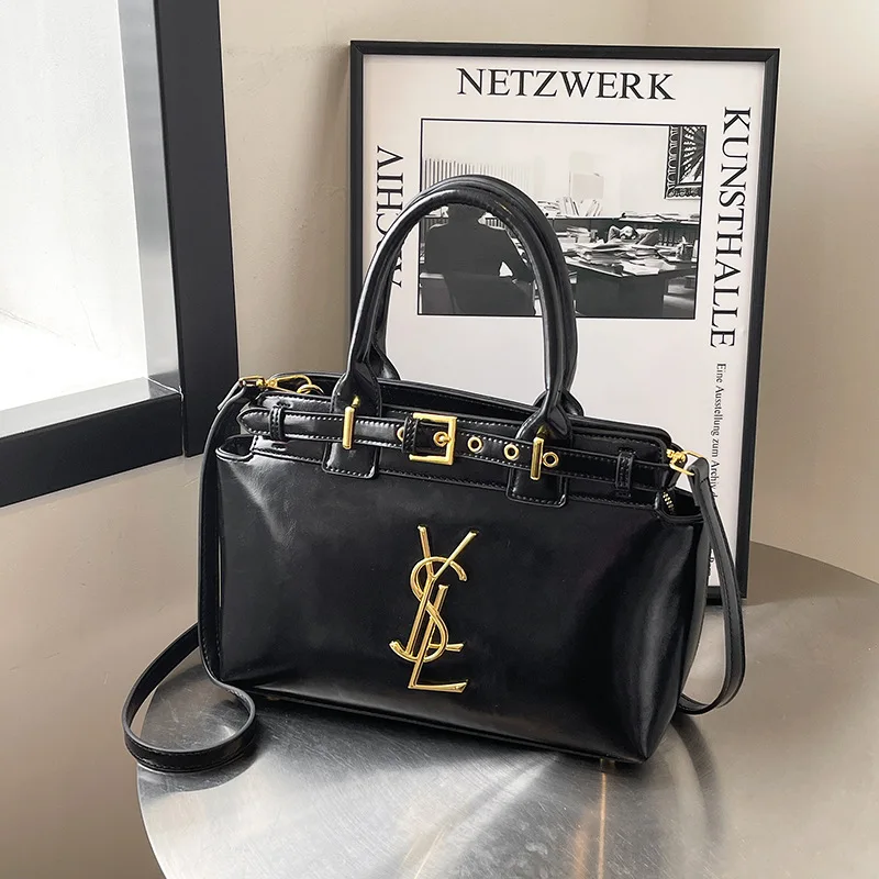 قسط الملمس حقيبة نسائية محمولة 2025 جديد حقيبة كتف ذات سعة كبيرة مزاجه ركاب حقيبة ساعي تنوعا حمل حقيبة