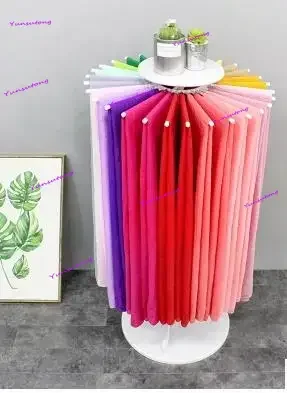 

Scarf shelf. Floor display rack. Display shelves of silk scarves. Multi-functional circular rotating frame