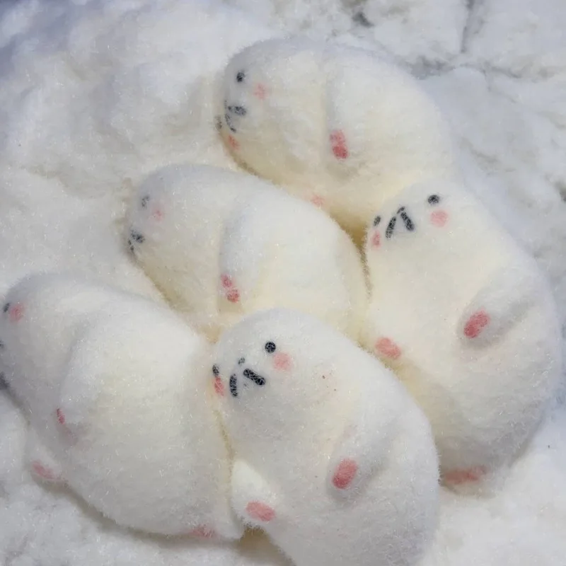 Adorable jouet à presser avec sceau, parfait comme cadeau pour les fêtes et les vacances pour adultes et enfants.