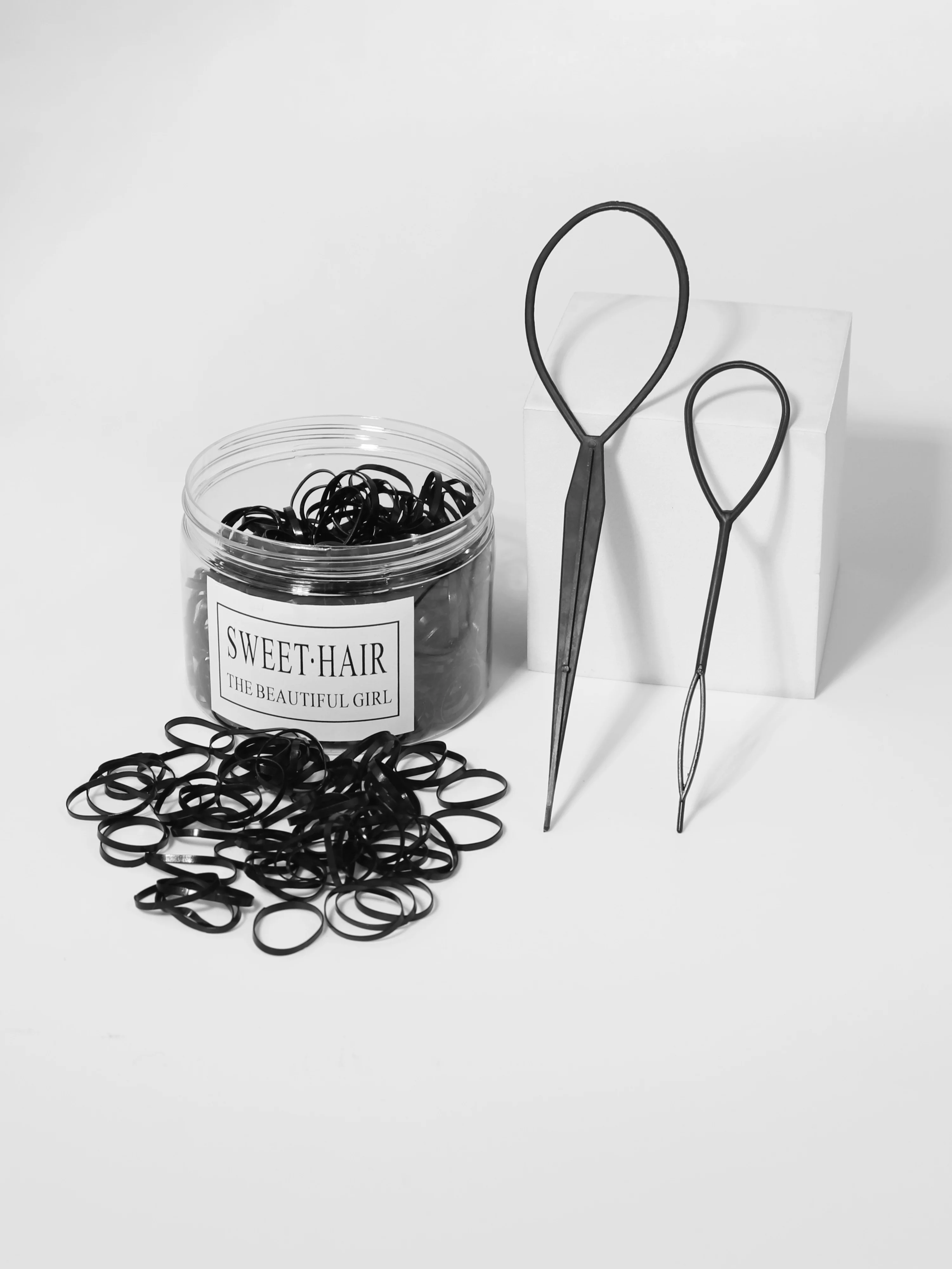 

2PCS hair rings and 1 can with elastic mini black rubber bands, daily use for tying hair and braiding