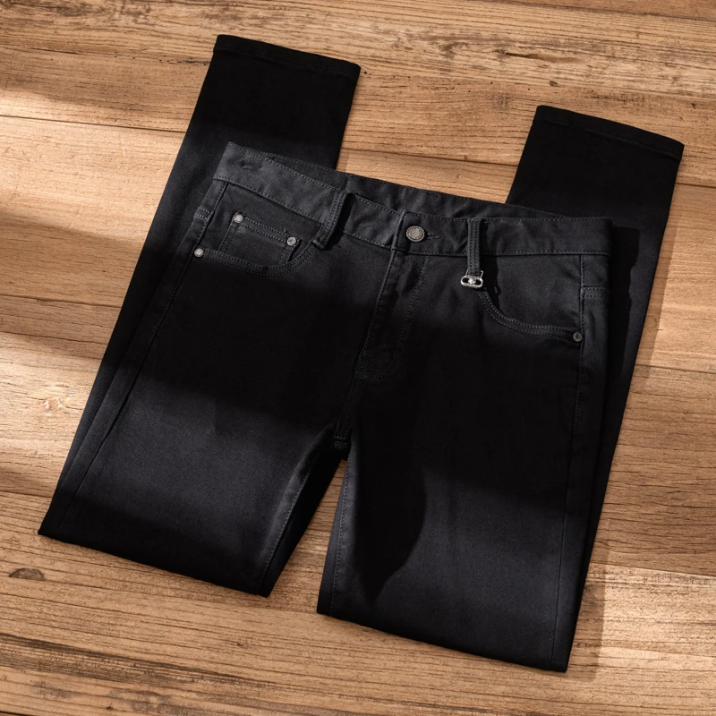 Pantalones vaqueros negros puros para hombre, pantalones casuales ajustados, versátiles, ligeros, de lujo, de gama alta, productos europeos, marca de moda