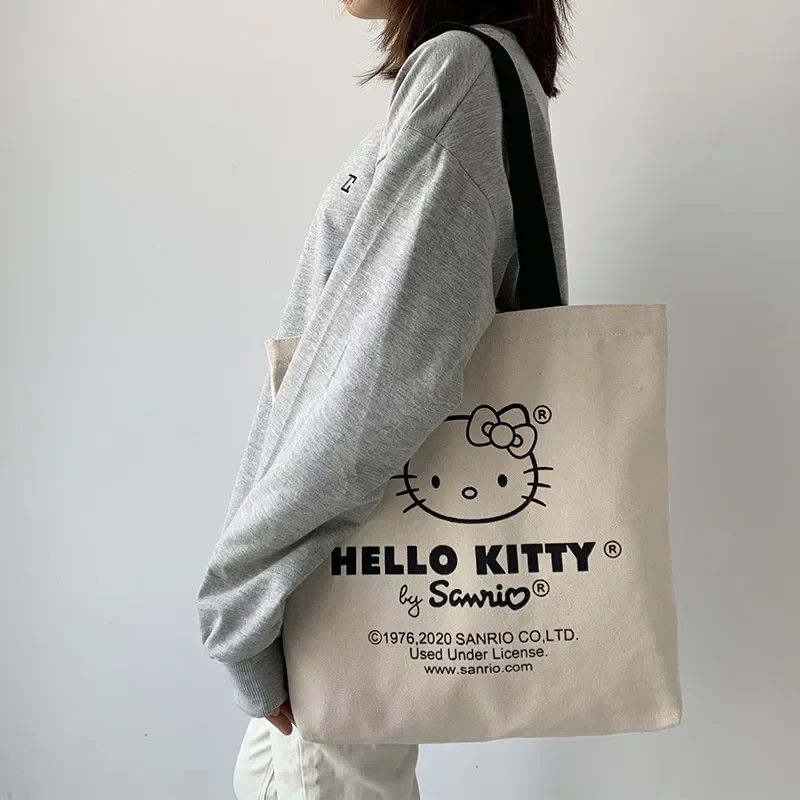 กระเป๋า tas Jinjing kanvas Hello Kitty กระเป๋าใส่ของชำแบบใช้ซ้ำได้กระเป๋าทรงสี่เหลี่ยมเดินทางแบบน่ารักกระเป๋าสะพายไหล่สวยงามปรับแต่งได้ตามต้องการ