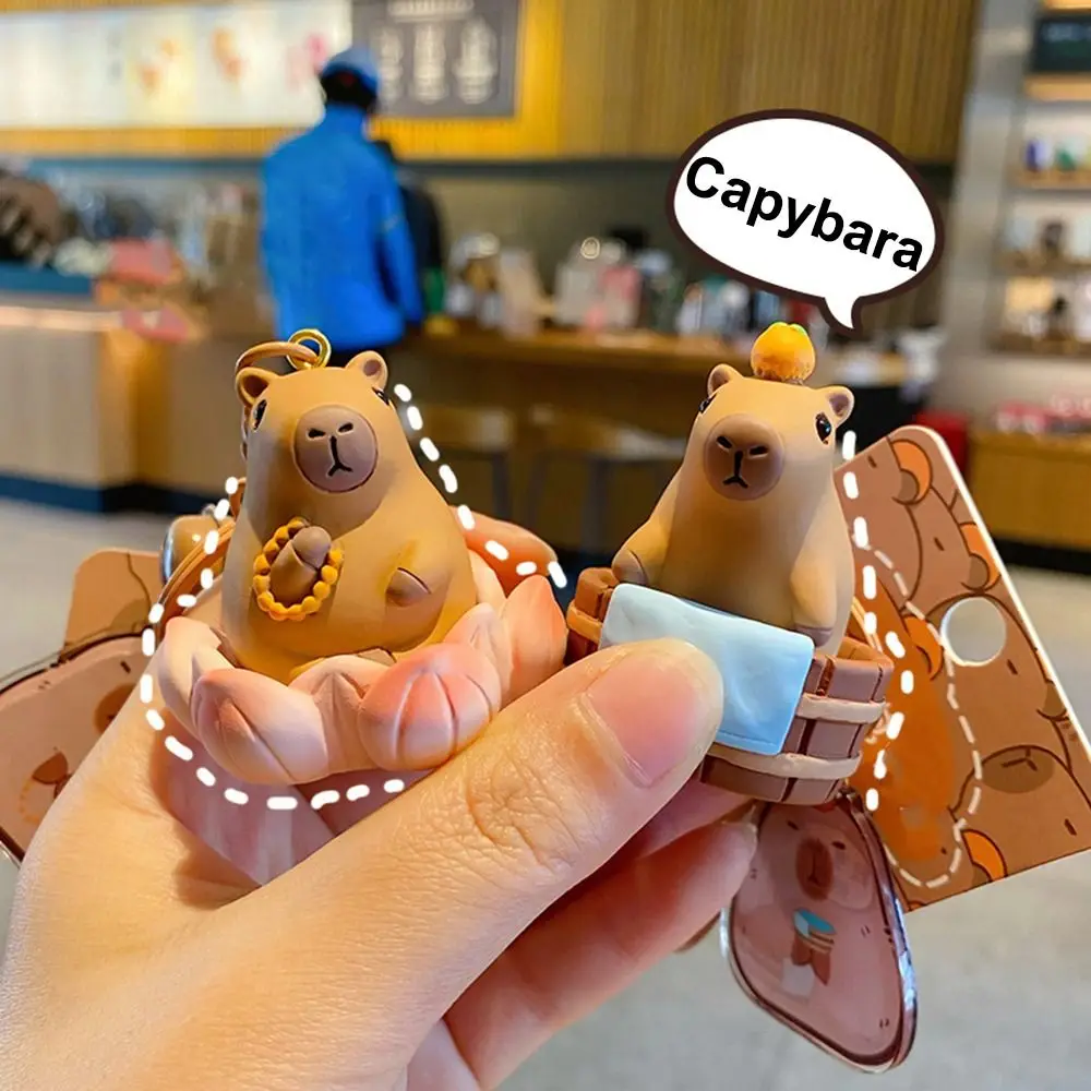 Resin Car Capybara Keychain Cartoon Lotus Bell Bath Riding Seagull Capybara Pendant Place It As a Decoration Cute