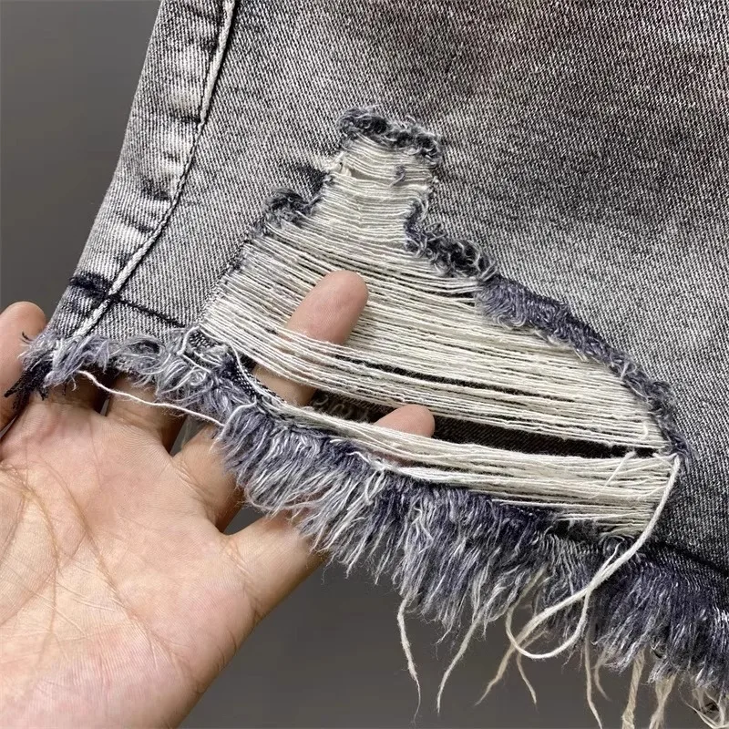 Worn Legs with Rough Edges Washed Black Denim Shorts 2026 Summer New Women Fashion A-line Wide Leg Hole Ripped Denim Shorts