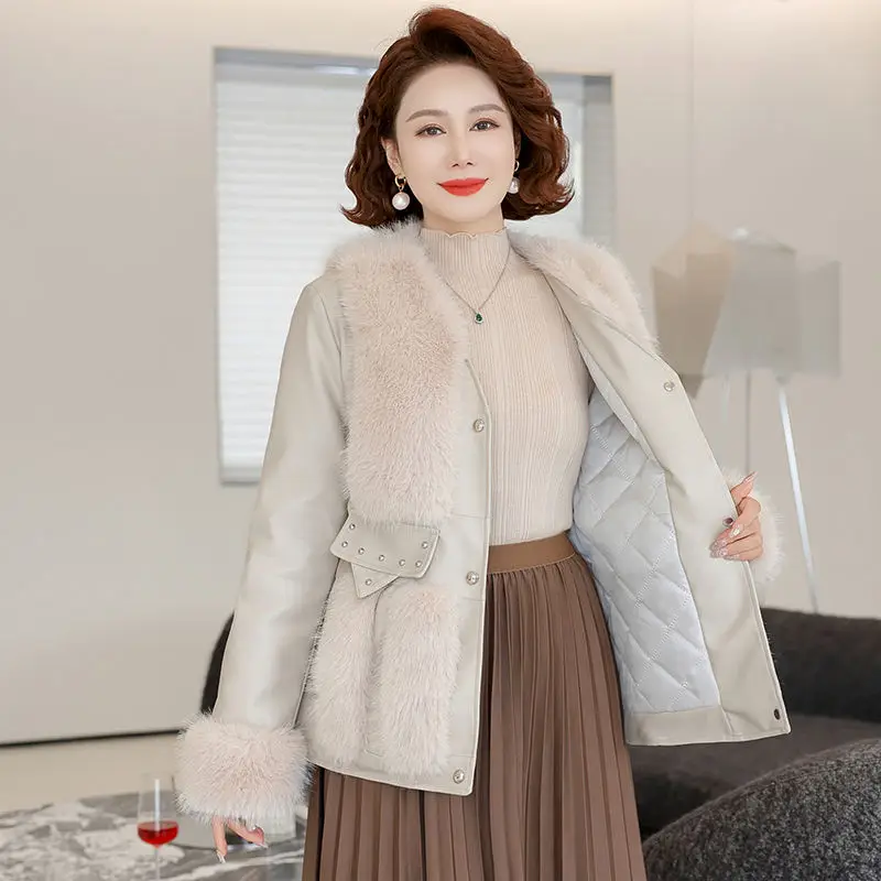 Damski płaszcz zimowy z futrem na rok 2025, luźny, zintegrowany futrzany, imitacja futra, kurtka bawełniana.