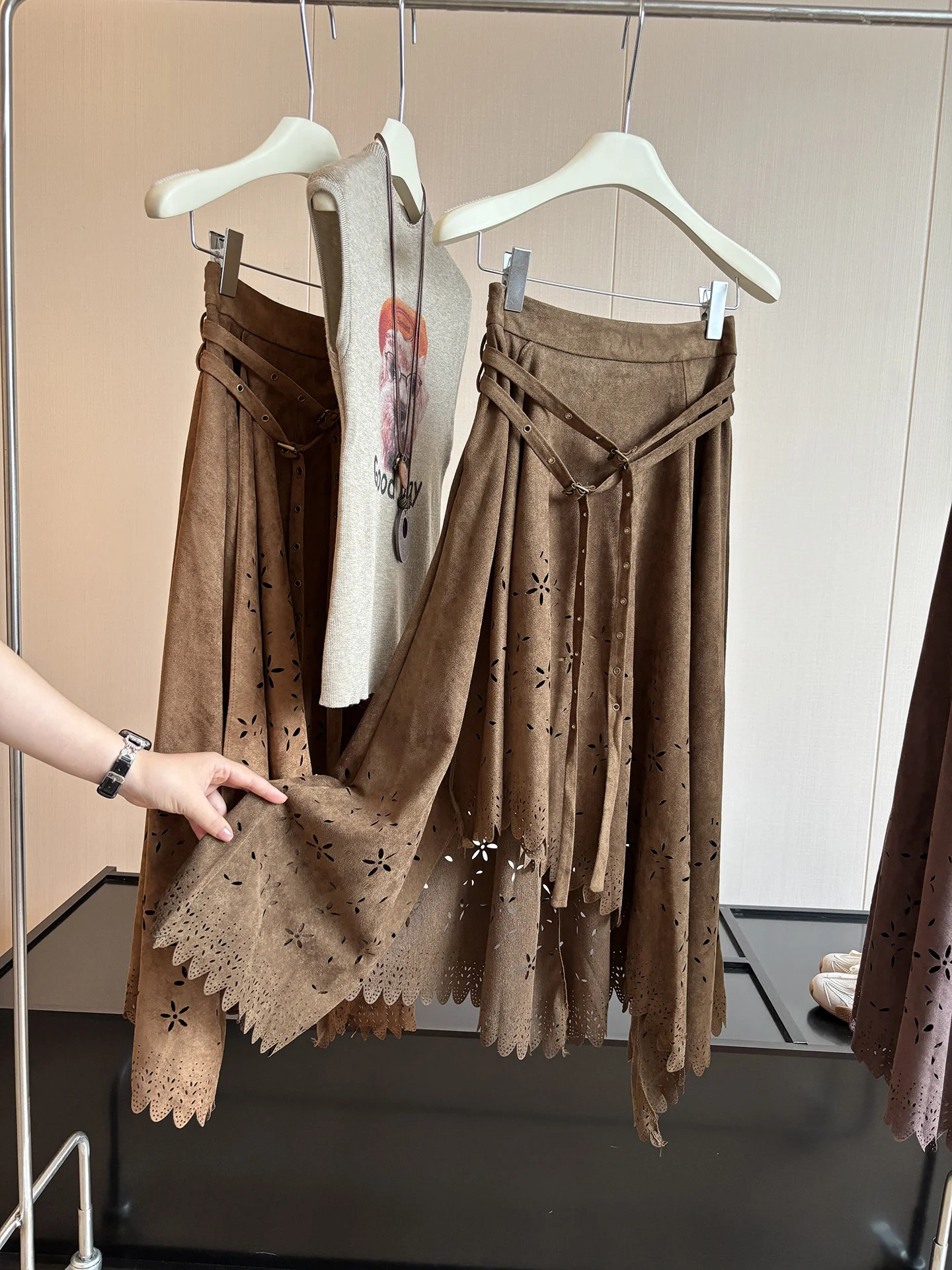 DIYI Autumn Pompom Half Skirt Pasture Faux Leather Drapey Asymmetrical Hollow out Midi Skirt Women High Waist A-Line Skirt