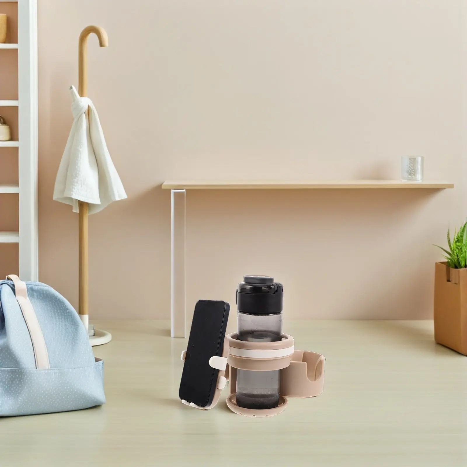 ベビーカー用カップホルダー兼スマホスタンド-3in1。水筒や哺乳瓶を収納できる、ベビーカー用アクセサリー。取り外し可能なコーヒーカップ付き。