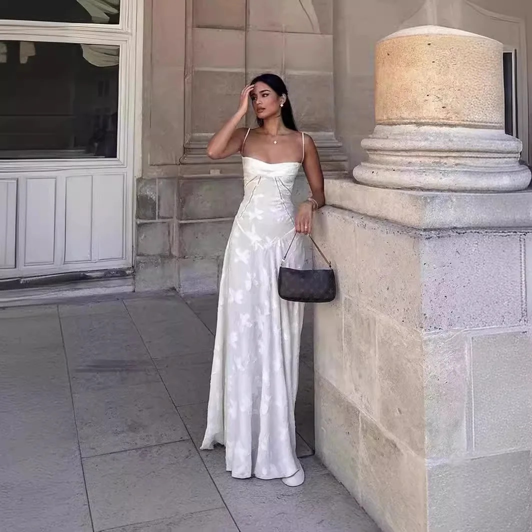 

2026 New French Style White Hollow Out Embroidery Maxi Dress For Women Textured Fabric Flowy Hem Floor Length Dress For Beach