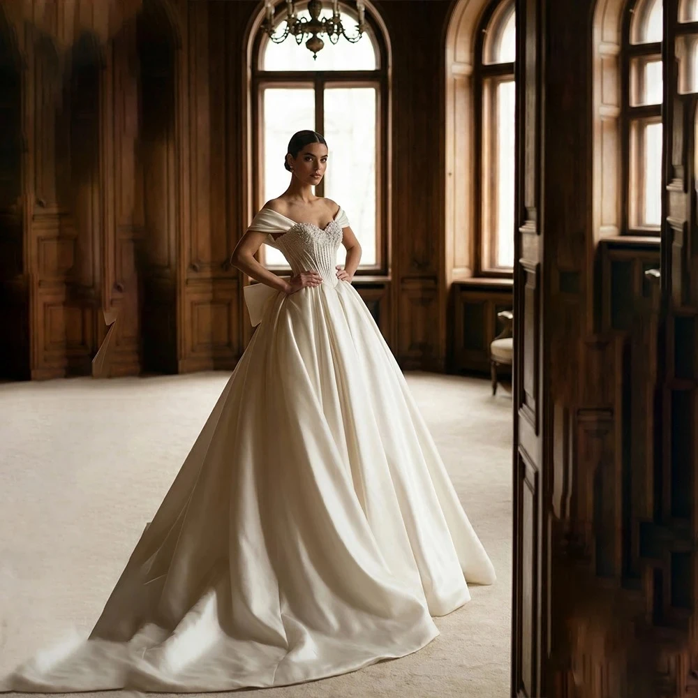 Customized Simple Satin Ivory A-Line Strapless Off Shoulder Wedding Dress Sweep Train Bridal Gown with Bow Back Pearl Details