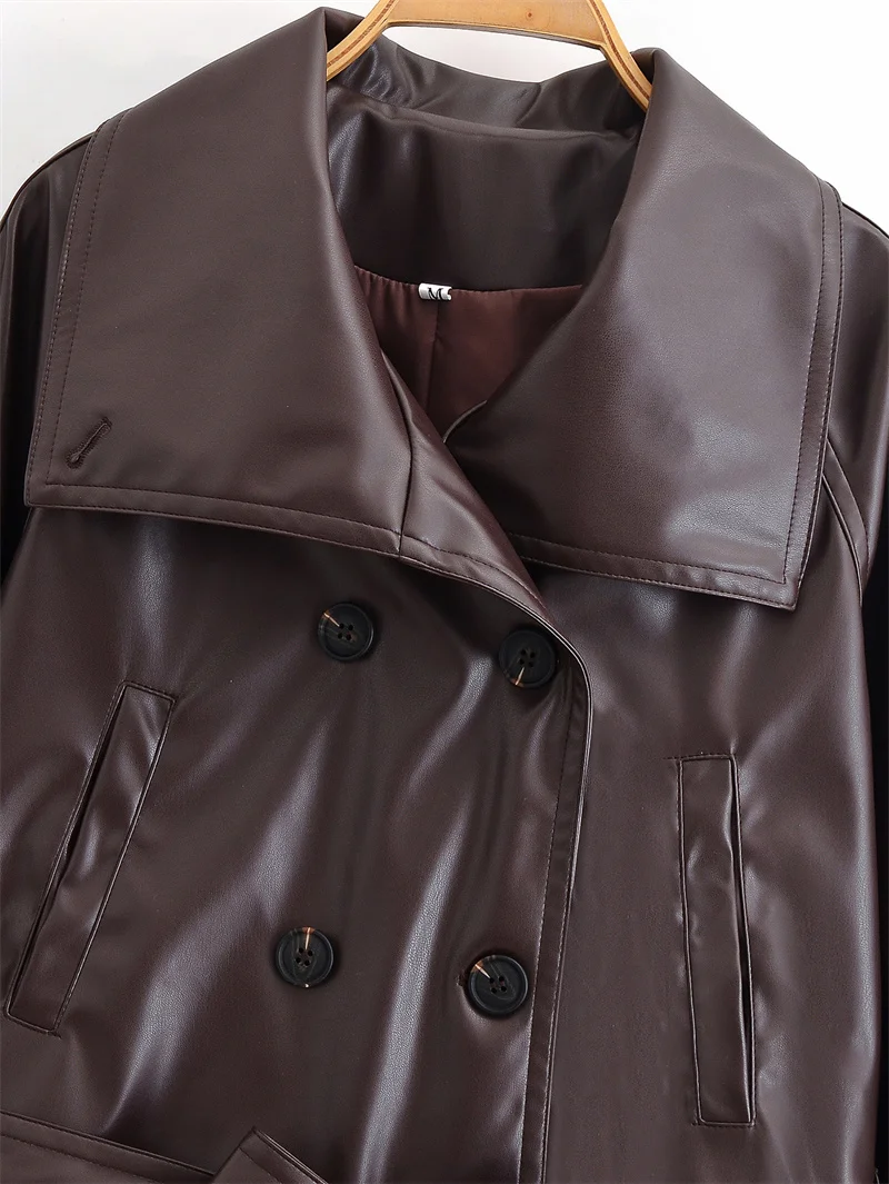 Cappotto da donna autunno nuovo stile marrone scuro manica lunga doppiopetto bavero cintura decorativa corta in ecopelle