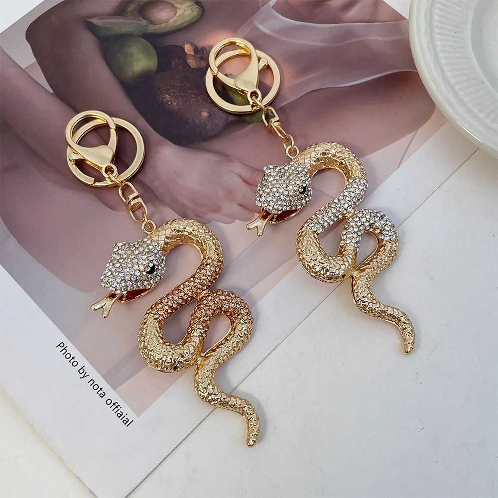 keychains for women 2025 luxury snake pendant with rhinestone car keychain Year of the Snake gift handbag accessory wholesale