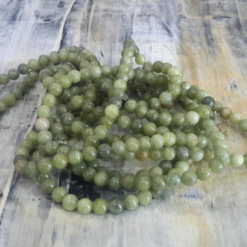 

Natural Chinese Jade 4mm, Approx 90 pce ,1mm hole Free postage.Oz Seller