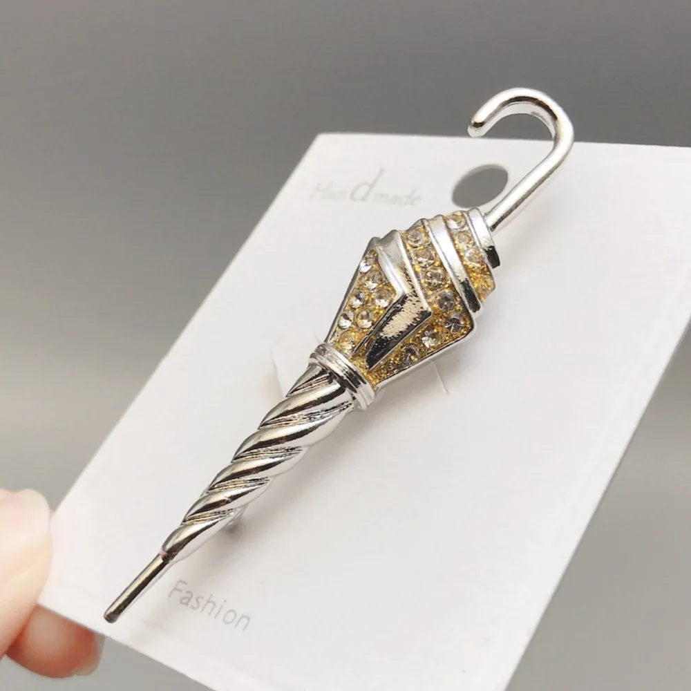 Cross border minimalist metal coat jacket chest flower pin accessory, French retro vintage diamond inlaid umbrella brooch