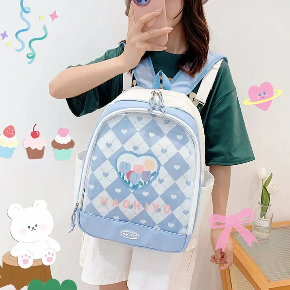 Mochila portátil de gran capacidad con exhibición de muñecas, bolso escolar transparente de nailon con dibujos animados de estilo coreano para estudiantes al aire libre