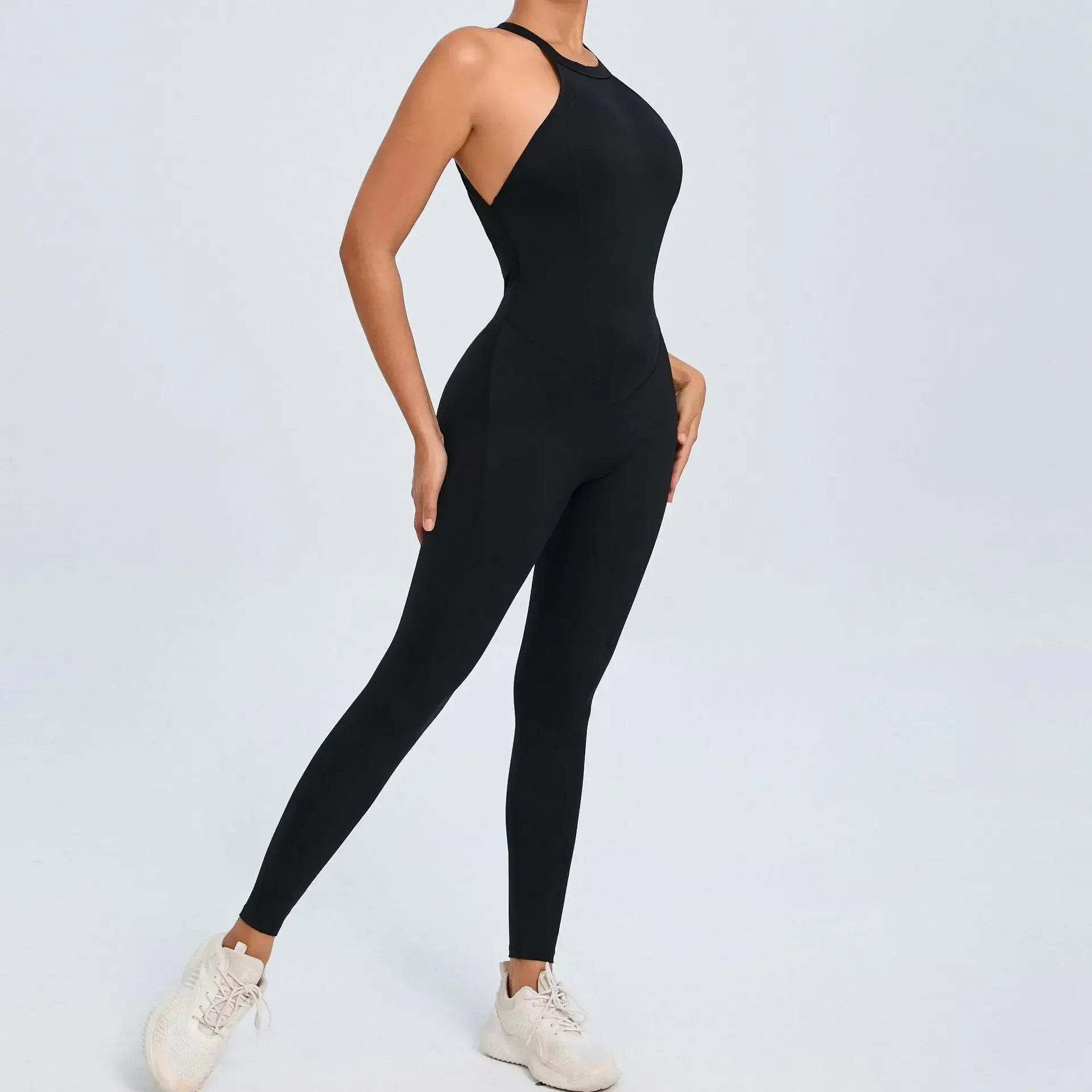 シームレスヨガジャンプスーツスポーツフィットネスピーチヒップリフティングバックレスバックルワンピーストレーニングジムワークアウトジャージ女性用