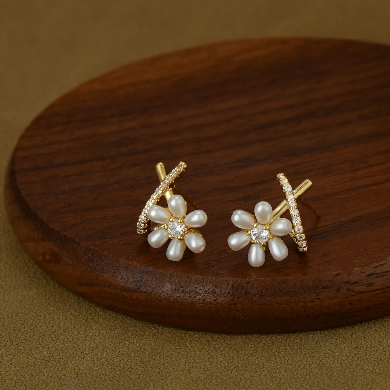 Autumn New Retro French Pearl 925 Silver Needle High-end Feeling Petal Delicate Cross Earrings for Women.