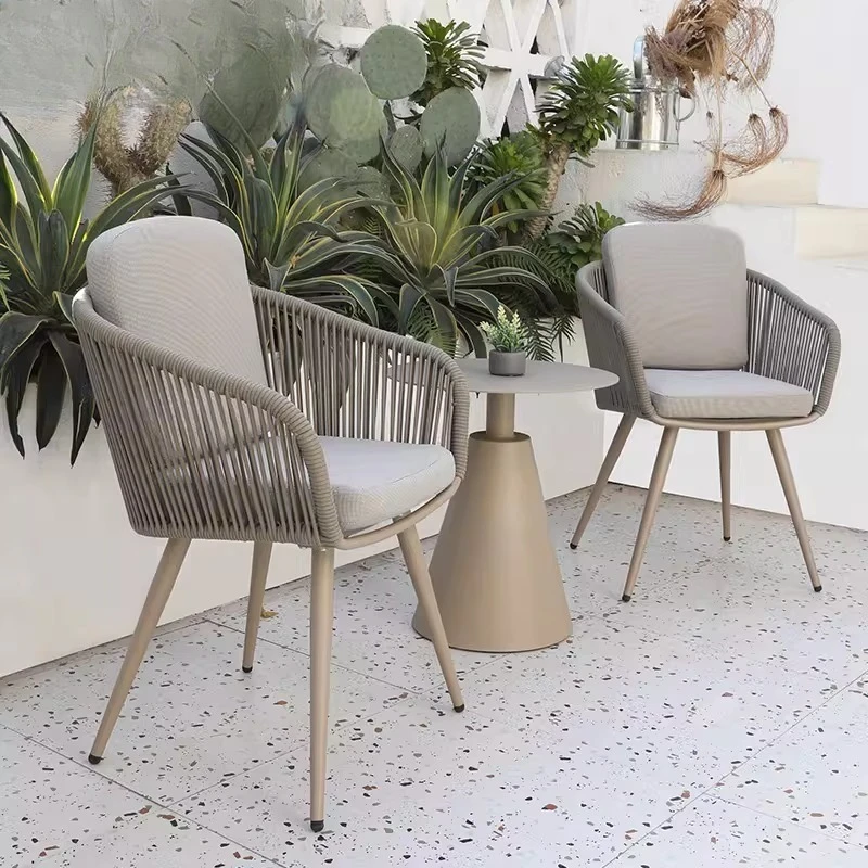 

Outdoor balcony small tables and chairs rattan chairs three-piece set Internet celebrities outdoor balcony leisure area layout