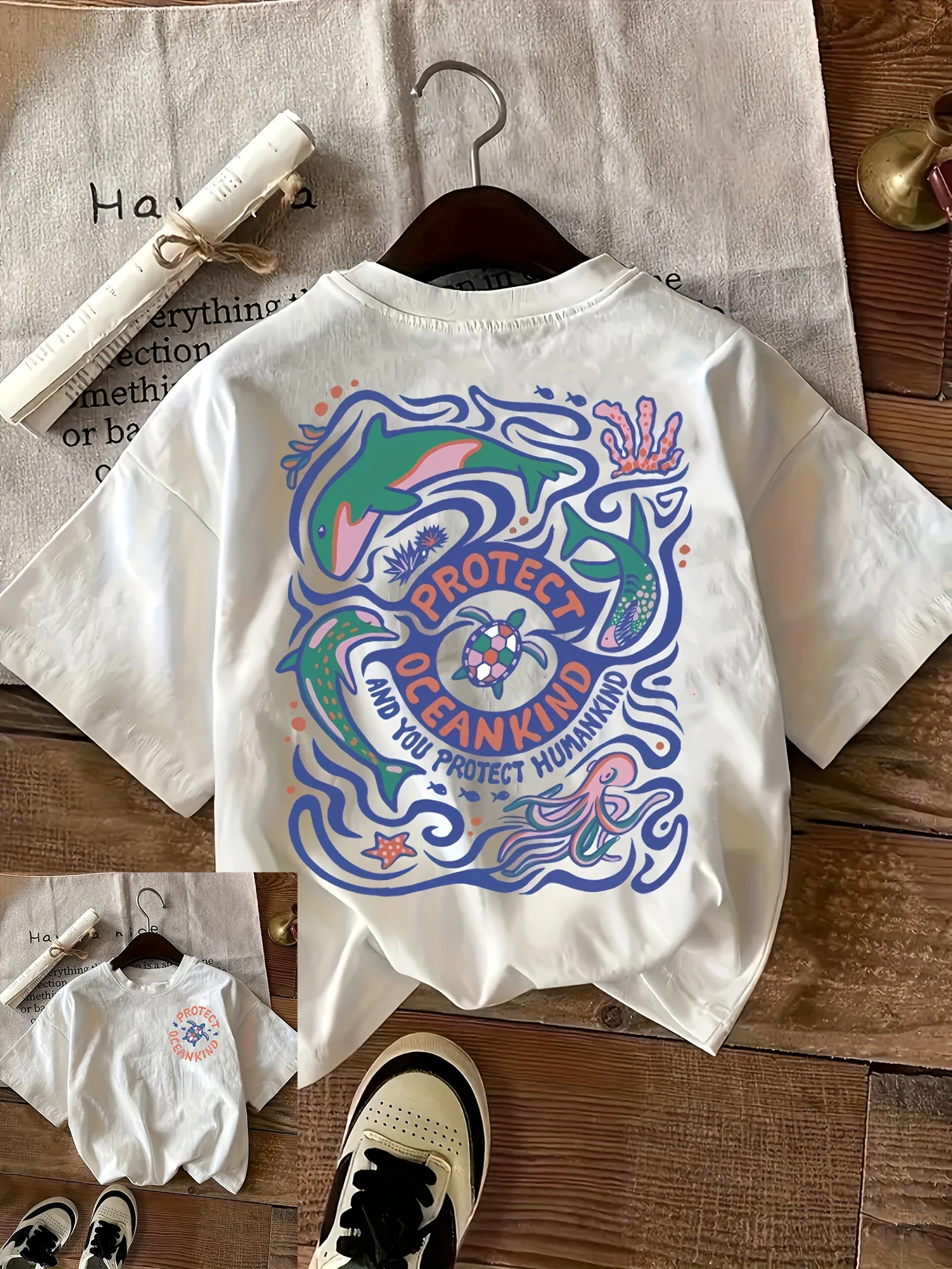 

Футболка с геометрическим принтом «Protect Ocean Kind» — непринужденный женский топ с круглым вырезом и короткими рукавами, повседневная эстетичная одежда