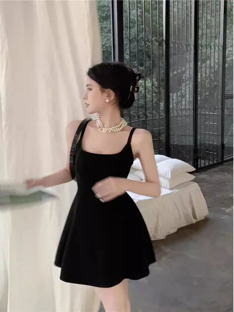 Black camisole dress summer French style 2024 new back knot temperament waist closing waist revealing skirt A-line short XM8D