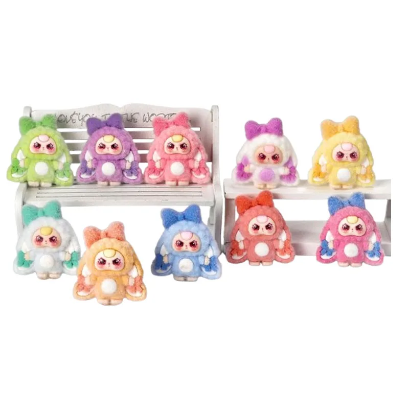 Nowa torebka-kluczyk dla niemowląt w stylu motylka z zawieszką dla dziecka w wieku trzech lat i ręcznie robionymi perłowymi dodatkami jako ozdoba lub prezent.