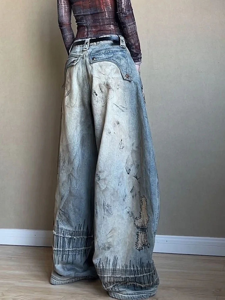 Amerikaanse retro gewassen denim jeans met noodlijdend en bedrukt ontwerp, losse en wijde pijpen streetwear broek voor dames