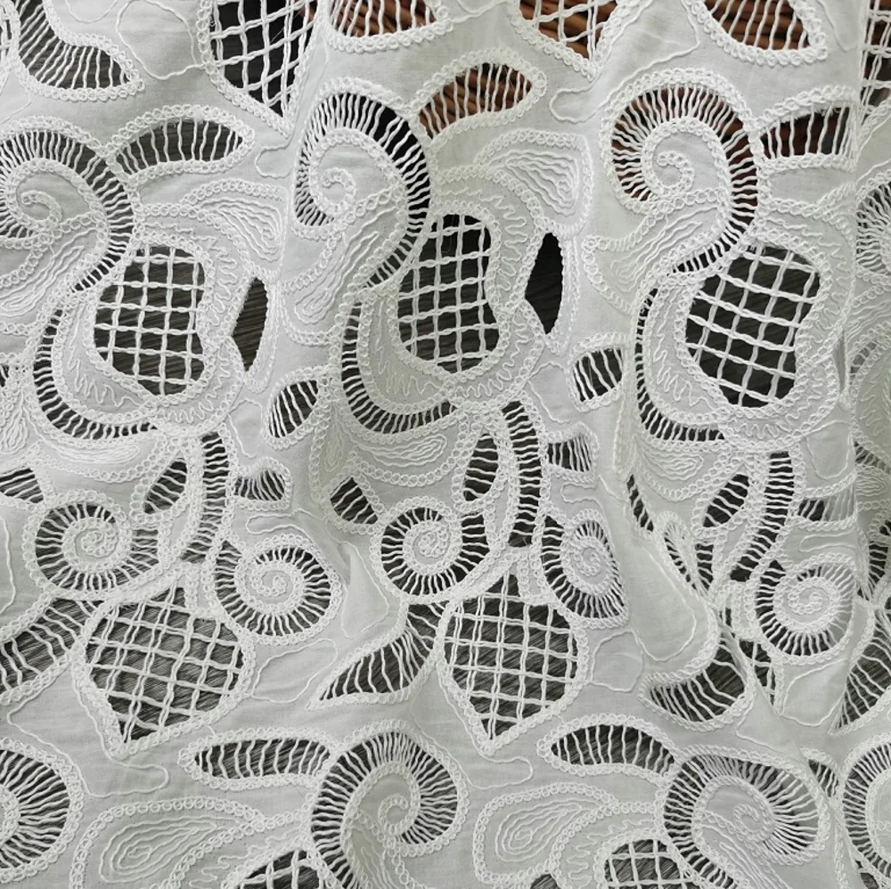 High-quality 100% cotton laser embroidered fabric for dresses, clothing, wedding dress fabric, DIY sewing, and hollow-out cloth