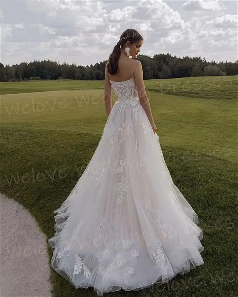 Prachtige A-lijn vrouwen Kant Applicaties Strapless Trouwjurken Robe De Mariée Aangepaste Backless Bruid Toga Vestido De Novia