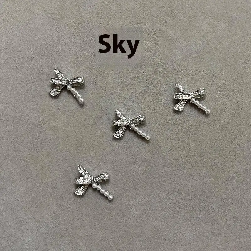 Lujosa decoración de uñas de circón, lazo de perlas de plata 3d, joyería en forma de mariposa, abalorio artístico para uñas, suministros de diseños de manicura Diy