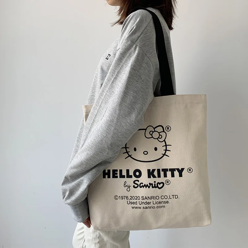 กระเป๋า tas Jinjing kanvas Hello Kitty กระเป๋าใส่ของเดินทางแบบน่ารักกระเป๋าสะพายไหล่ใช้ซ้ำได้ตามต้องการ